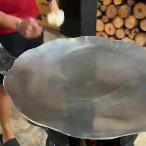 Disco de arado sobre o fogareiro